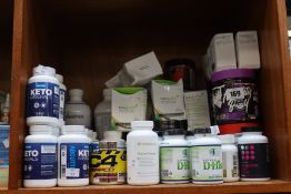 A quantity of assorted supplements and related items.
