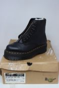 A pair of as new Dr Martens Sinclair boots (UK 4).