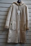 An as new Oui reversible sheep skin style coat (Size 38 - RRP £309).