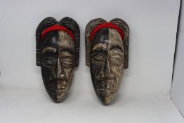 Two as new African Wood Masks of Yaa Asantewaa from Ghana, 