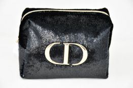Eight Dior Trousse pouches, luxury miniatures collection.