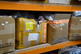 Four boxes of as new clothing and related items.