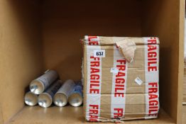 Nine bottles of Thermalmix insulating paint additive.