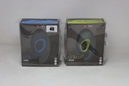 A Calexotics Link Up Max Blue and a Link Up Edge Green vibrating cock ring, both boxed as new.