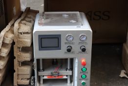 A pre-owned LCD Laminating Machine (Damaged).