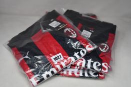 Seven as new Puma AC Milan replica shirts (S, 3 x M, 2 x L, XL).