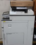 A Ricoh MPC2011SP multi function laser printer scanner, serial number G478M130299.