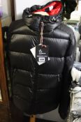 An as new Moncler coat (Size 4).