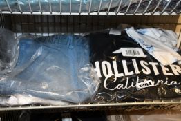Seven items of as new Hollister clothing to include jeans, hoodies and tops.