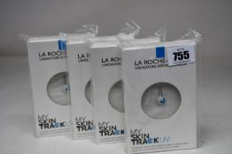 Four boxed as new La Roche-Posay My Skin Track UV wearable sensors.