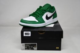 A pair of as new Nike Air Jordan 1 Low sneakers (UK 8.5).