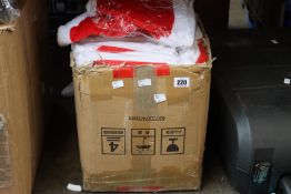 A box of as new Santa hats.