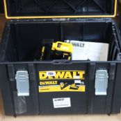A DeWalt DCN660 18V XR Brushless Nailer with batteries, charger and case.