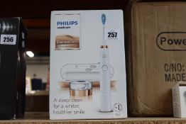 A boxed as new Philips Sonicare Diamond Clean electric toothbrush in white.