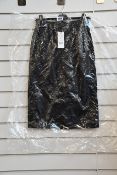 An as new Set Clothing leather skirt with slit detail (Size 34 - RRP €190).