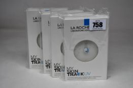 Four boxed as new La Roche-Posay My Skin Track UV wearable sensors.