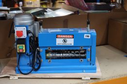 A wire stripper machine.