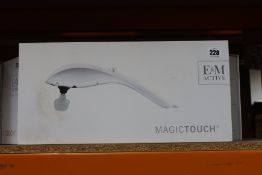 A boxed as new E & M Active Magic Touch Hand Held Massager (RRP £129) https://emactive.com/em-