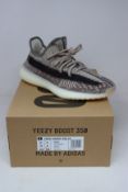 A pair of as new Adidas Yeezy Boost 350 V2 (UK 8).