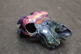 A decorative hand painted animal skull by unknown artist.