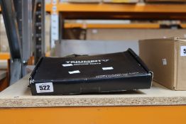 Two boxed Triumph Motorcycle chain and sprocket kits.