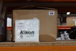 Twenty five sealed Nikon MXA22061 type 104 dust covers.