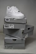 Three pairs of youths as new Nike Air Force 1 trainers (2 x UK 4, 1 x UK 6).
