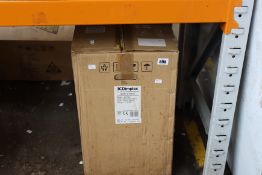 A boxed Dimplex Bari Optiflame electric stove.