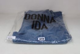 A pair of as new Donna Ida Minnie The High Top Flare jeans (W33 - RRP £215).