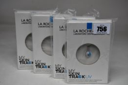 Four boxed as new La Roche-Posay My Skin Track UV wearable sensors.