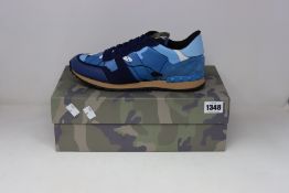 A pair of as new Valentino Garavani camouflage sneakers (EU 42).