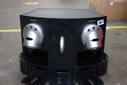 A pre-owned Nespresso Gemini 200 coffee machine (May need repairs).