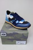 A pair of as new Valentino Garavani camouflage sneakers (EU 41).