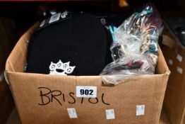 A quantity of as new music related T-shirts and accessories; Fleetwood Mac Rumours T-shirts (