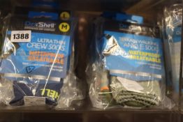 Nine pairs of as new DexShell waterproof/breathable ultra thin crew socks and four pairs of DexShell