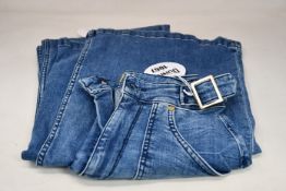 A pair of as new Donna Ida Minnie The High Top Flare jeans (W24 - RRP £215).