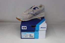 A pair of as new Mizuno Sky Medal trainers (UK 8.5).