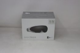 A boxed as new E & M Active Magic Touch Optic Massager (RRP £118) https://emactive.com/em-active/