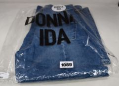 A pair of as new Donna Ida Minnie The High Top Flare jeans (W24 - RRP £215).