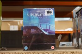 Two as new Supernatural seasons 1-13 DVD box sets.