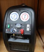 A Javac XTR-Pro dual voltage refrigerant recovery machine.