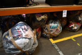 Eight bags of assorted clothing and related items.