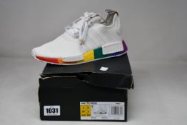 A pair of as new Adidas NMD_R1 Pride trainers (UK 5.5).