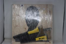 An axe throwing board with two axes (Over 18s only).