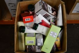 A box of assorted as new luxury beauty products.