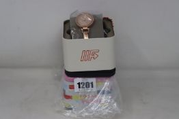 Two ladies as new Fossil ES3226 watches (RRP £90 each).