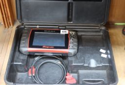 A pre-owned Snap-On Solus Ultra EESC318 diagnostic machine scanner.