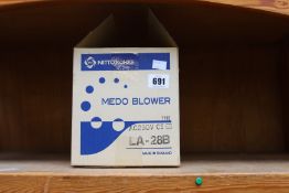 A boxed as new MEDO LA-28B air pump.