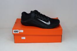 A pair of as new Nike Metcon 6 trainers (UK 7.5).