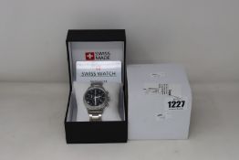 An as new Swiss Made Leica chronograph watch in silver.